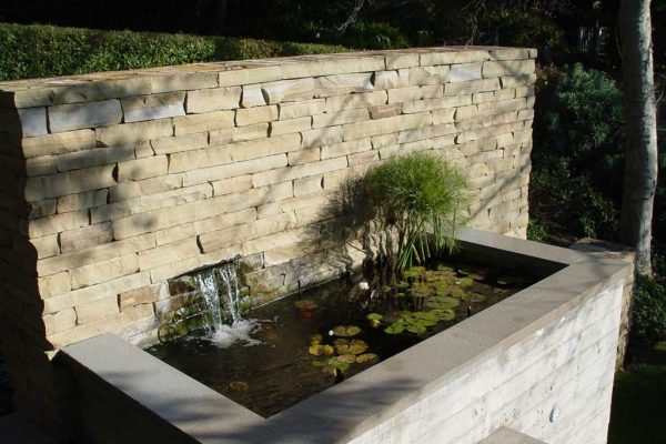 custom-koi-fish-pond-with-small-fountain_riviera-pools-and-spas_premium-pool-builder-in-los-angeles-and-southern-california